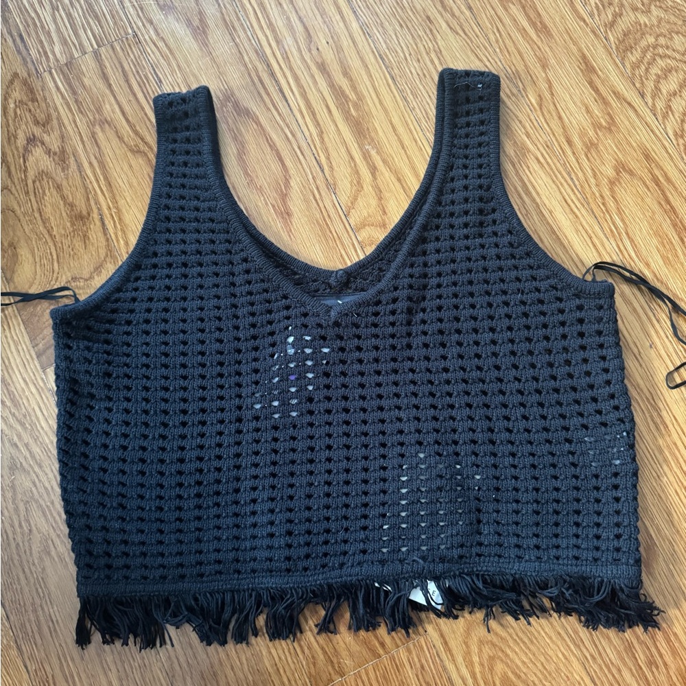 Miou Muse black Crotchet Tank Top
Never worn,Tags still on
